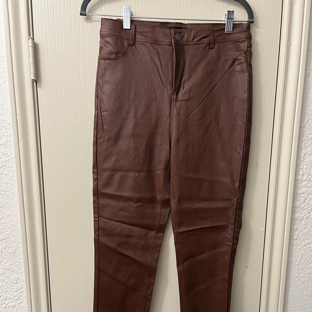 Brown faux leather pants. Very comfortable & stretchy. Perfect condition. Size L